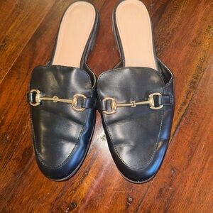 BCBGeneration Black Leather Mules with Gold Accent